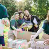 Volunteers Pack Relief Food and Clothing for Mission Airlift