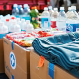 Relief supplies prepared for distribution: water, food, blankets