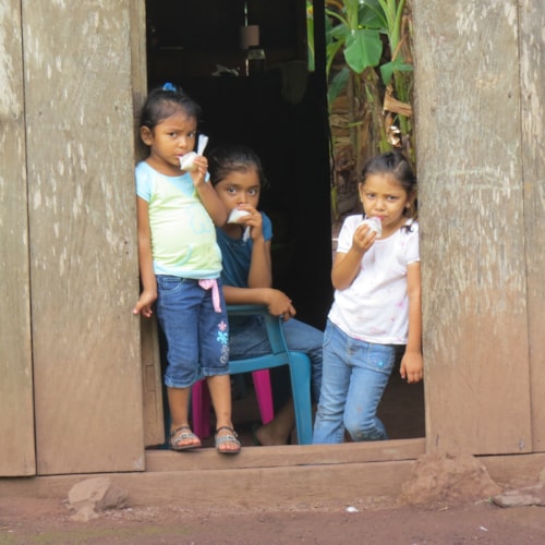 Children in a doorway during Honduras community medical outreach